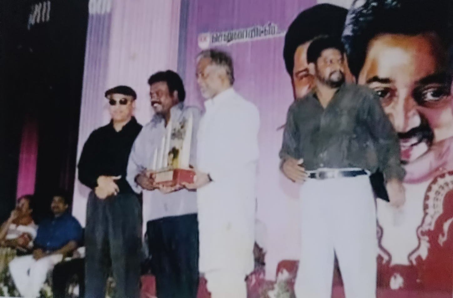 Recieving Award from Mr.Rajikanth and Mr.Kamal Haasan